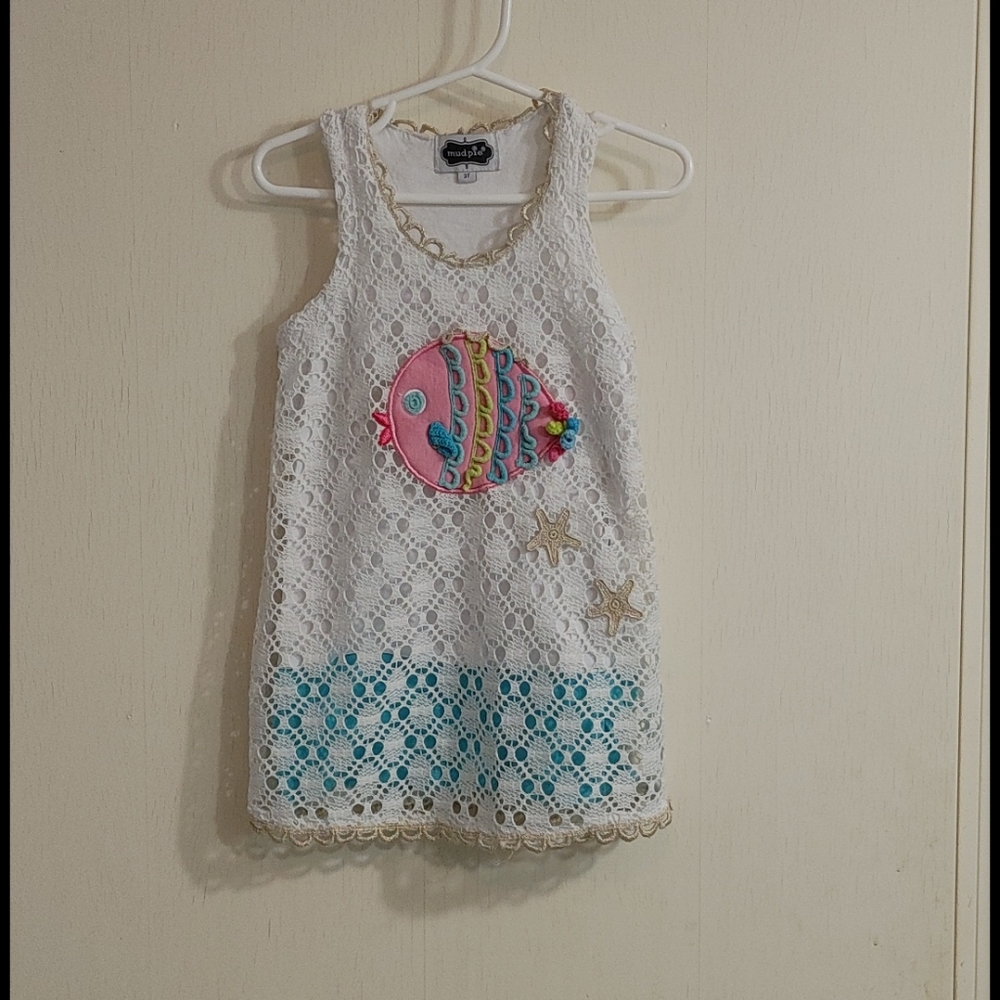 Fishy dress. Maybe over bathing suit